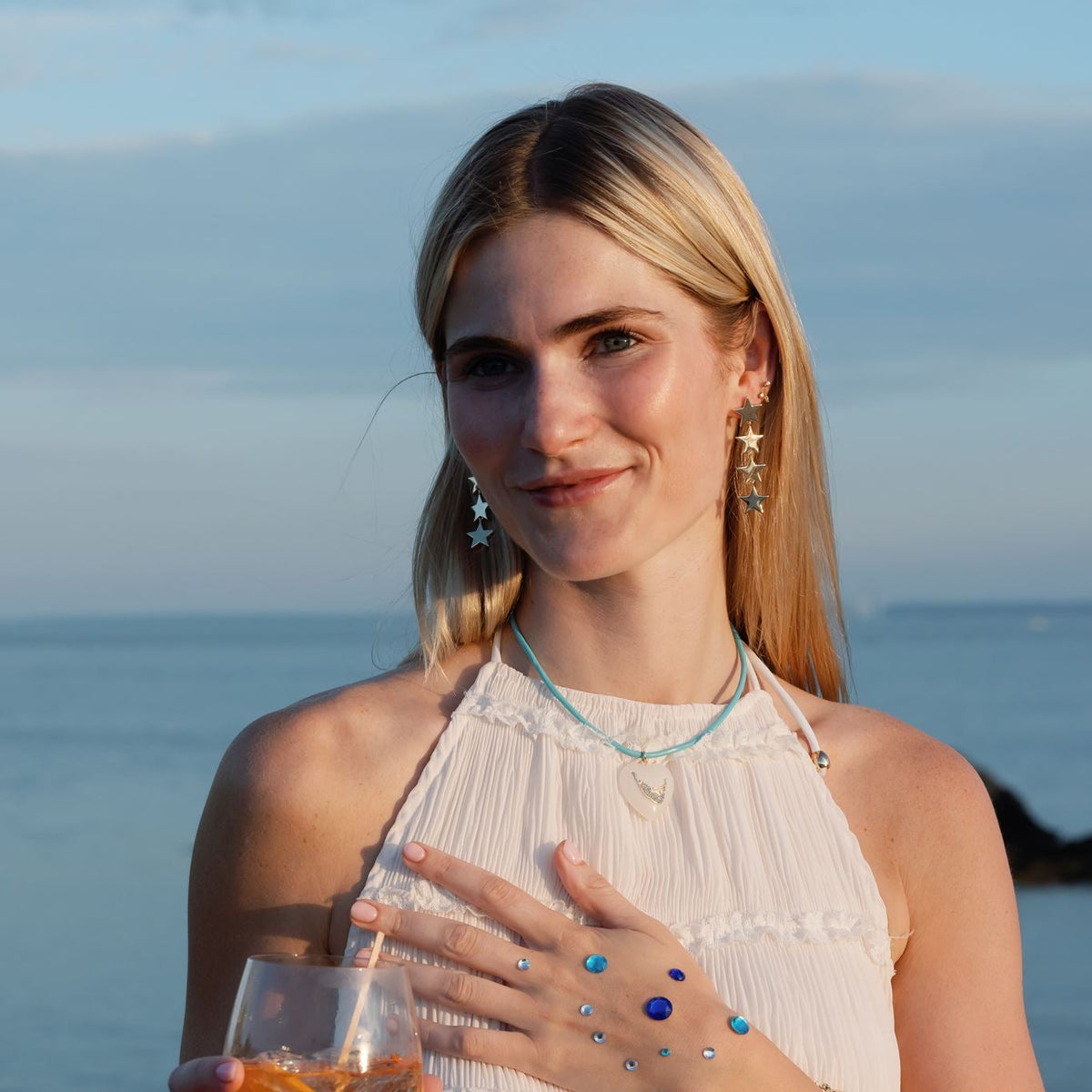 The Golden Star Drop Earrings